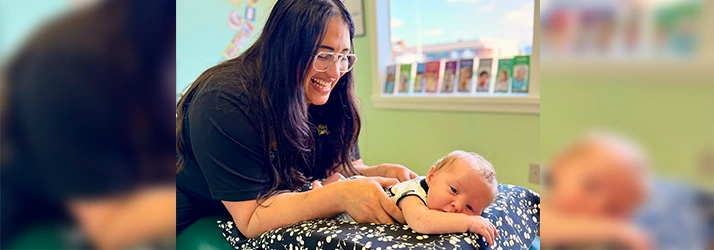 Nicole Mercado Adjusting A Baby