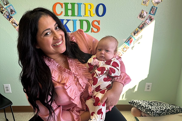 Chiropractor Nicole Mercado With Baby